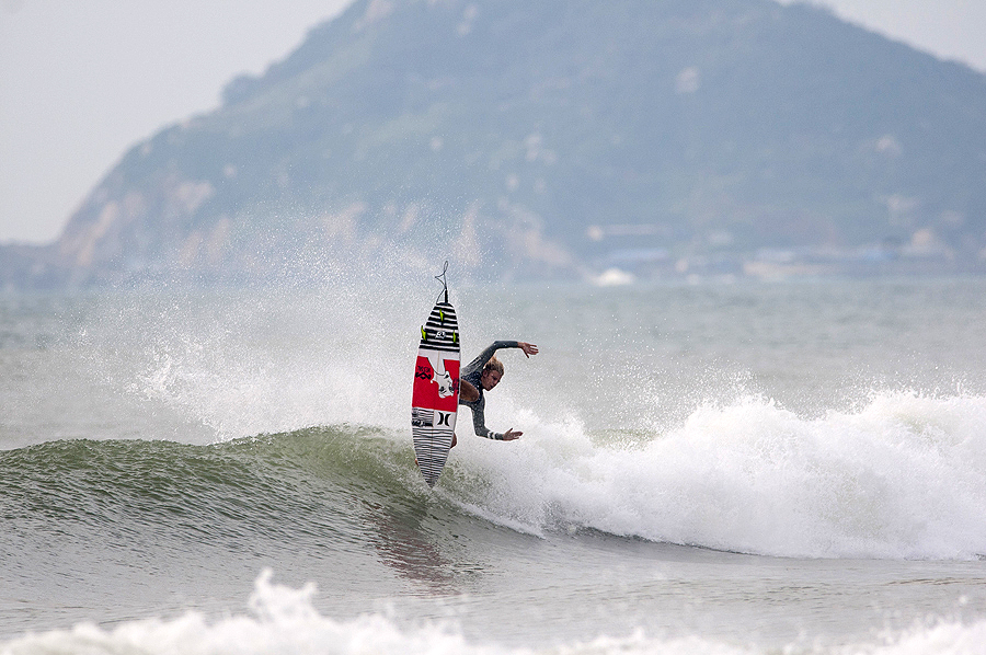 Australia's Kai Hing going vertical in China. Team Australia will be looking to defend their 2012 and 2013 Team Championship. Photo: ISA/Rommel Gonzales